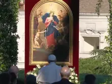 Pope Francis prays before the crowned image of Mary, Undoer of Knots, in the Vatican Gardens, May 31, 2021.